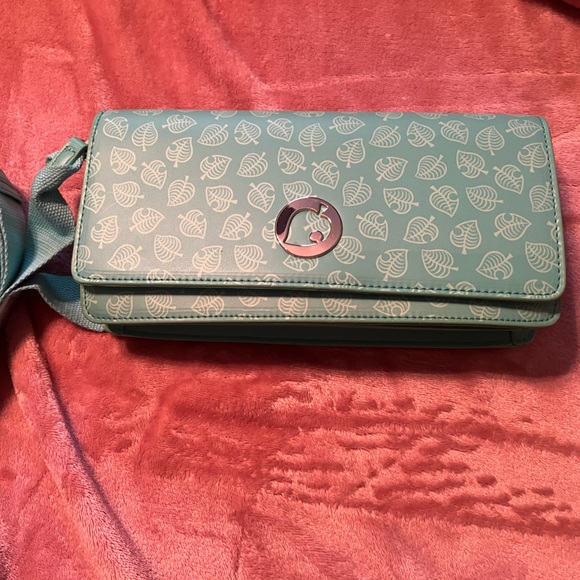 Animal Crossing Nintendo Switch Lite case. Never used, with strap. - Picture 2 of 10